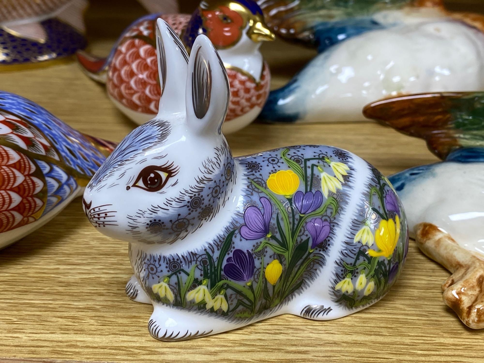 A graduated set of Beswick flying ducks and five Royal Crown Derby animal paperweights and another similar rabbit, fish 18cm